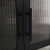 Carmen vitrinekast met geribbeld glas - Zwart metaal 110x40x140cm